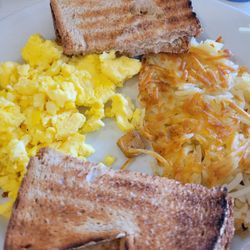 Jim's On The Course - Scrambled eggs, hash browns and wheat toast.