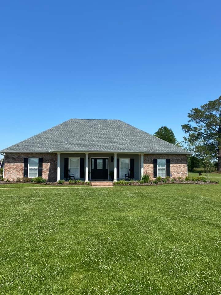 Slide of John Theriots Roofing