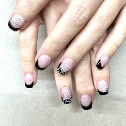 Pansy Nails & Spa - Dipping nails with designs.