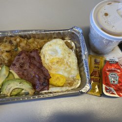 Tost Cafe - Eggs home fries turkey bacon and side of avocado