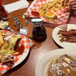 Broadway Diner - Turkey club, cinnamon pancakes with a side of bacon and a kid's cheese burger.