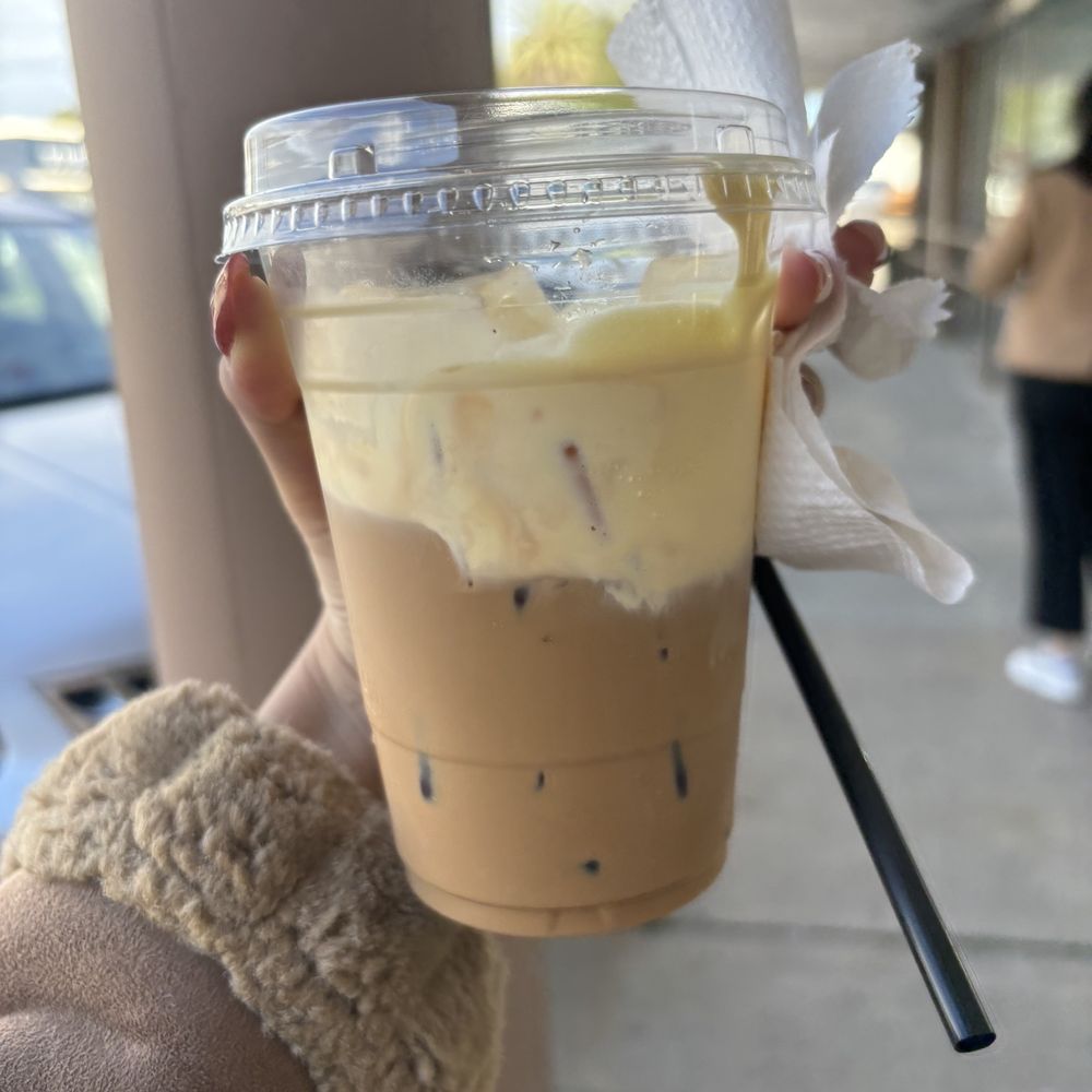 Bamita - a hand holding a cup of iced coffee - Vietnamese Near Me - Orlando, Florida