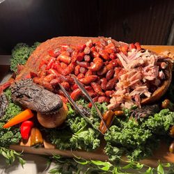 Messina's Catering & Events - Whole roasted alligator