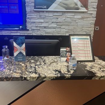 MassageLuXe - Front display (prices, brochures, and appointment cards) - Massage Near Me - Henrico, Virginia