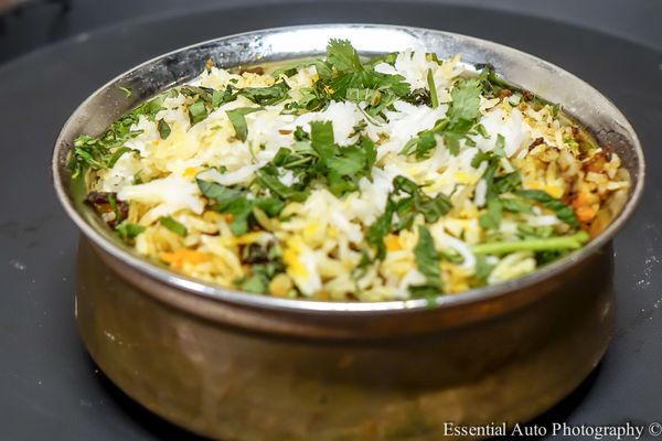 Thali Indian Cuisine by null