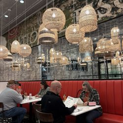The Pioneer Woman Mercantile - Dining room. I'm obsessed with the lighting