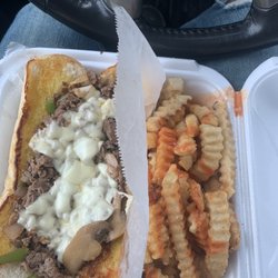 Wings Fish Philly - Steak Philly with everything on it( steak, green peppers, mushrooms, and cheese) amazing.