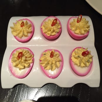 Rustic Root - Deviled eggs - that pepper adds some kick! Oh, and they put them in beet juice to add that pink color. Nice touch! - Cocktail Bars Near Me - San Diego, California