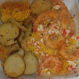 Shrimp and rice place, with added potatoes Shrimp and rice place, with added potatoes