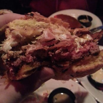 Redcoat Tavern - Double bacon burger with blue cheese on an onion roll. Zip sauce on the side - Bars Near Me - Royal Oak, Michigan
