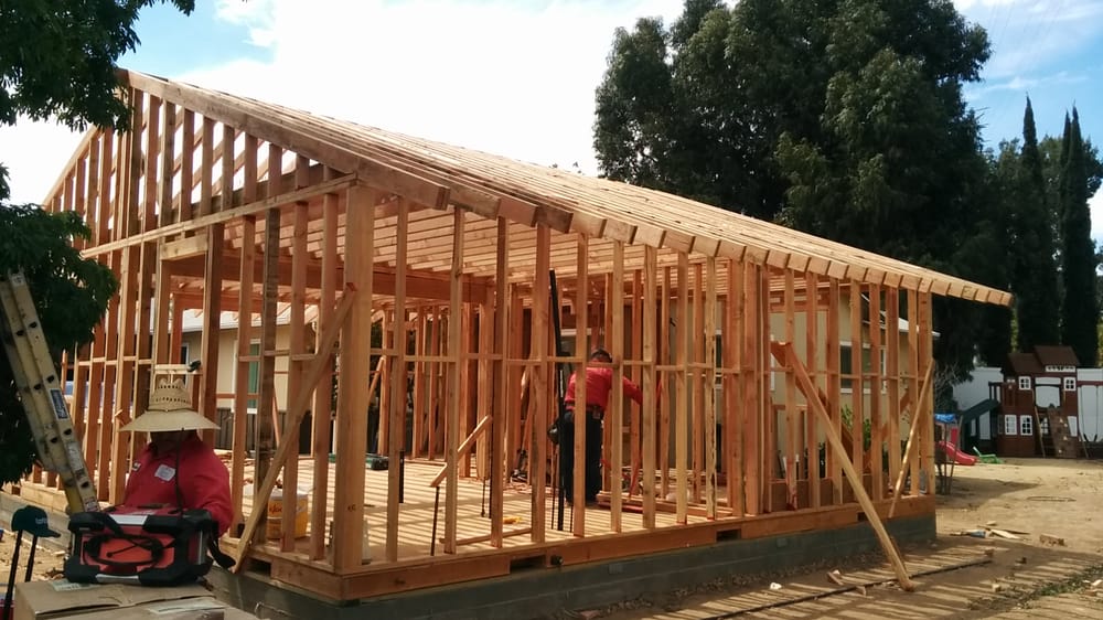 Slide of Mike's Roofing & Building