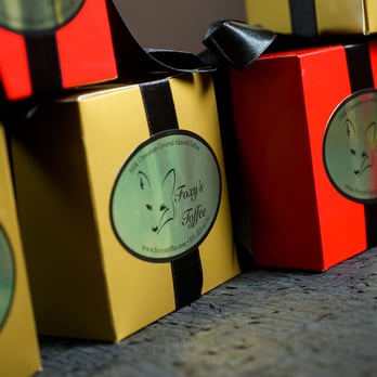 Foxy's Toffee - Toffee comes in 1/2 and 1 pound boxes. We also do special orders, gift baskets and have bulk discounts. Great for Company gifts. - Desserts Near Me Foxy's Toffee - Toffee comes in 1/2 and 1 pound boxes. We also do special orders, gift baskets and have bulk discounts. Great for Company gifts. - Desserts Near Me