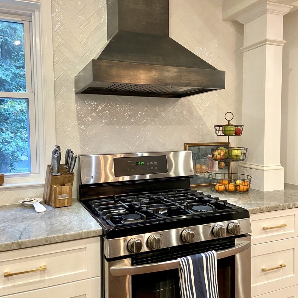 KBR Kitchen and Bath - a stainless steel range hood - General Contractors Near Me - Fairfax, Virginia KBR Kitchen and Bath - a stainless steel range hood - General Contractors Near Me - Fairfax, Virginia