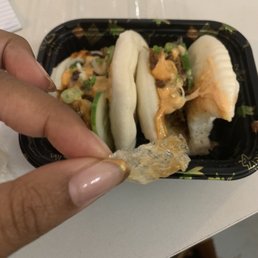 Took one bite of my pork bun and began to chew. Spit it out when I felt something hard right before swallowing. IT WAS THIS PLASTIC