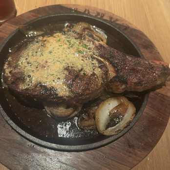 CARVE American Grille - Central Austin - This 22 oz. Bone-In Cowboy Ribeye* looked so good but... no seasoning ruined it for me - New American Near Me - Austin, Texas