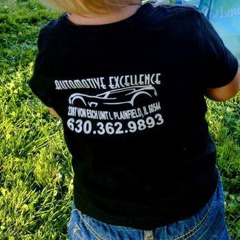 Automotive Excellence - Bobbie Jean sporting our attire, her birthday was combined with the grand opening of the new shop. - Auto Repair Near Me - Plainfield, Illinois Automotive Excellence - Bobbie Jean sporting our attire, her birthday was combined with the grand opening of the new shop. - Auto Repair Near Me - Plainfield, Illinois