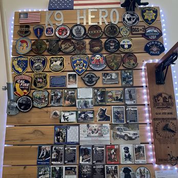 Dueling Dogs Brewing - K9 patch wall. - Breweries Near Me - Lincoln, California