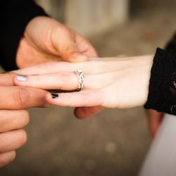 Immortalized Image Photography - Wedding Photographer Christal Sharp took photograph of couple exchanging weddings rings at a small ceremony in Lithia Park, Ashland, Oregon