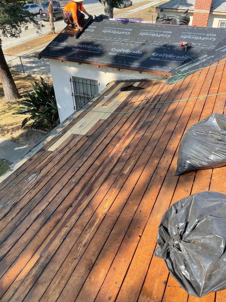 Slide of Golden Touch Roofing