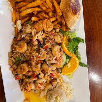 Mariscos La Costa - a plate of food on a table - Mexican Near Me - Chicago, Illinois