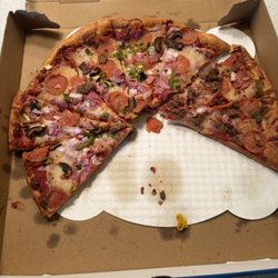 The extra large pizza is about 30 bucks with tax, but it seems for adults easily. There are 12 pieces in the extra large.