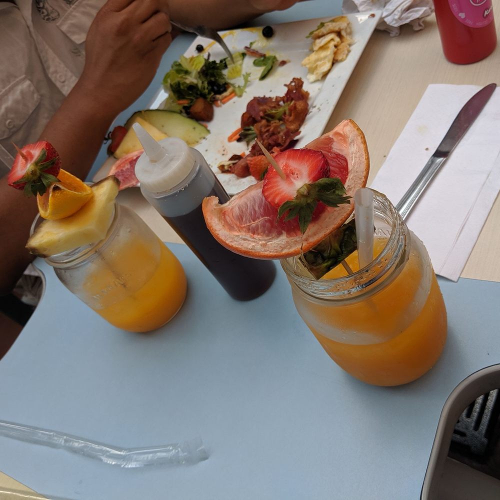 Karine's - Orange juice and an already devoured Karine's Supreme. - Breakfast & Brunch Near Me - Toronto, Ontario Karine's - Orange juice and an already devoured Karine's Supreme. - Breakfast & Brunch Near Me - Toronto, Ontario