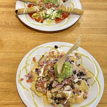 Wild One - Pork and Plantain Flautas (Top) Wild Ones Nachos with Chicken (Bottom) - Mexican Near Me - Pleasanton, California Wild One - Pork and Plantain Flautas (Top) Wild Ones Nachos with Chicken (Bottom) - Mexican Near Me - Pleasanton, California