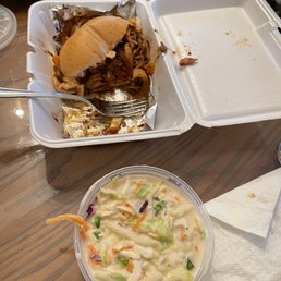 Pulled Chicken Sandwich with sautéed peppers and onions and coleslaw Pulled Chicken Sandwich with sautéed peppers and onions and coleslaw