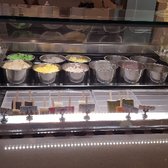 Photo of Creamery Pop - Westminster, CA, United States. The "other" flavors (the ones with the name tags only) and the gelato pops are off to the right side, toward the back area