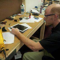 Screen Geeks - The Lufkin Store Manager, Charles, working on an iPad 2 Screen Repair.