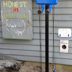 CK Bikes - Outside work station with supplies on the side of the entrance.