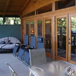 Firefly Lodge - Covered riverfront deck for year round outdoor dining and lounging.