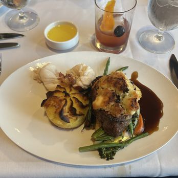 Caretta on the Gulf - Center Cut Filet with blue cheese crust. 8oz Maine lobster tail. Potato truffle mixed vegetables. - New American Near Me - Clearwater, Florida Caretta on the Gulf - Center Cut Filet with blue cheese crust. 8oz Maine lobster tail. Potato truffle mixed vegetables. - New American Near Me - Clearwater, Florida
