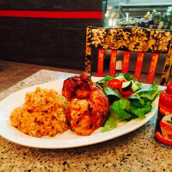 Original Grill'É - a plate of food on a table - Pizza Near Me - Montreal, Quebec Original Grill'É - a plate of food on a table - Pizza Near Me - Montreal, Quebec