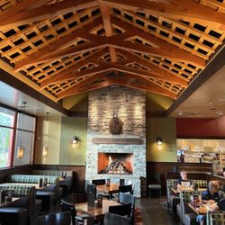 Lazy Dog Restaurant & Bar - Dining area with fireplace