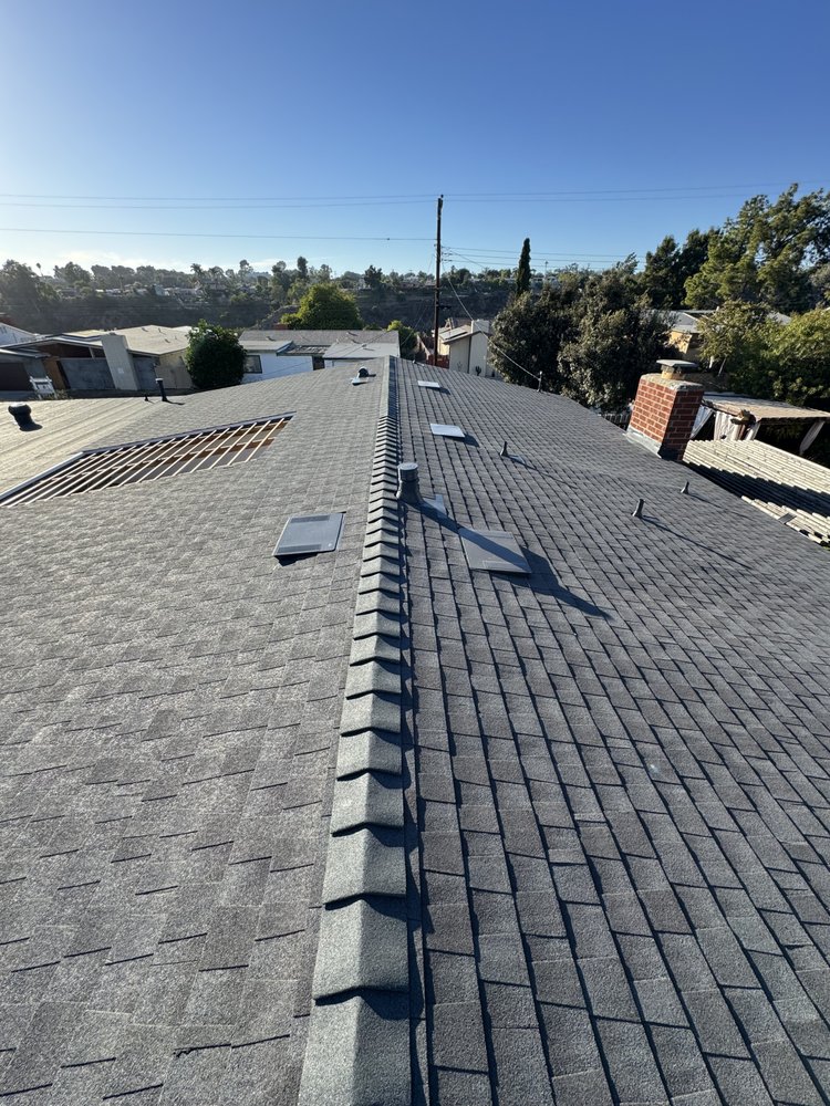 Slide of Mister Roofing