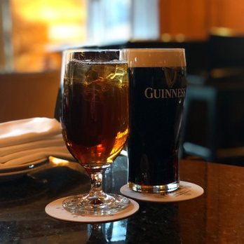 Mallard Lounge - two glasses of beer on a table - Lounges Near Me - Whistler, British Columbia