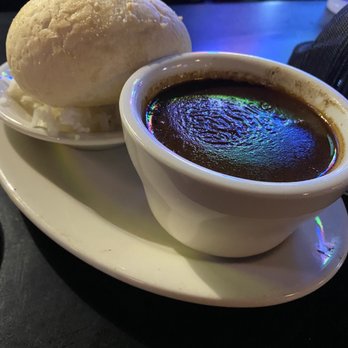 Prejean's - Duck and andouille gumbo with pistolette. - Cajun/Creole Near Me - Lafayette, Louisiana Prejean's - Duck and andouille gumbo with pistolette. - Cajun/Creole Near Me - Lafayette, Louisiana