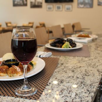 Grille 92 - a plate of food and a glass of wine - American Near Me - Groton, Connecticut Grille 92 - a plate of food and a glass of wine - American Near Me - Groton, Connecticut