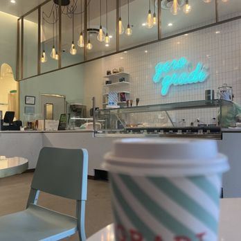 Zero Gradi - a cup of coffee sitting on a table - Gelato Near Me - Dallas, Texas Zero Gradi - a cup of coffee sitting on a table - Gelato Near Me - Dallas, Texas
