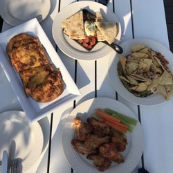 Top of Newport Bar & Lounge - Flat bread "daily" special was pulled pork flatbread. We really liked this! Goat cheese and tomato app. Lobster nachos, wings.