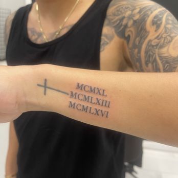 Suite Dreamz Tattoo Studio - Jake did the cross in 2021 and Neil did the Roman numerals 2023 - Tattoo Near Me - Honolulu, Hawaii Suite Dreamz Tattoo Studio - Jake did the cross in 2021 and Neil did the Roman numerals 2023 - Tattoo Near Me - Honolulu, Hawaii