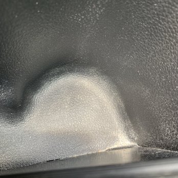 Caliber Collision - Dirt from body shop poor detail - Body Shops Near Me - San Antonio, Texas