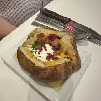 Ruth's Chris Steak House - BAKED POTATO - Steakhouses Near Me - Orlando, Florida Ruth's Chris Steak House - BAKED POTATO - Steakhouses Near Me - Orlando, Florida