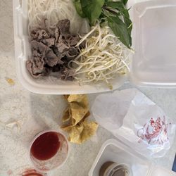Pho Saigon - $27 one serving beef pho spring roll. Meat already cooked. Very weird. Not normal pho. Cheapness. Beware