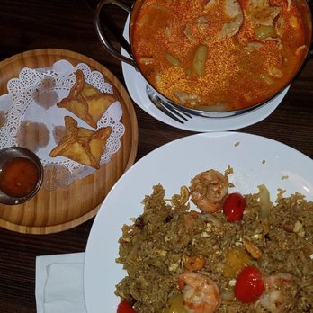 Rice Thai - Stuffed crab rangoon (6 pieces). shrimp pineapple fried rice. Massaman chicken curry. - Thai Near Me - Patchogue, New York Rice Thai - Stuffed crab rangoon (6 pieces). shrimp pineapple fried rice. Massaman chicken curry. - Thai Near Me - Patchogue, New York