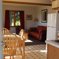 Northwoods Inn & Cottages - Cabin 26 kitchen living room
