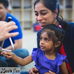 Preschoolers explore melody and rhythm, aiding speech and language development