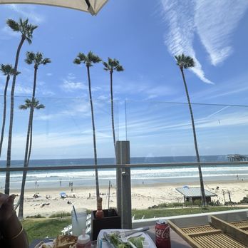 Caroline's Seaside Cafe by Giuseppe - From our corner table overlooking the beach. - Cafes Near Me - La Jolla, California Caroline's Seaside Cafe by Giuseppe - From our corner table overlooking the beach. - Cafes Near Me - La Jolla, California