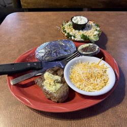 Joe's Log Cabin Tavern & Steak House - 6oz steak, baked potato, salad with dressings and garnish = $18.95